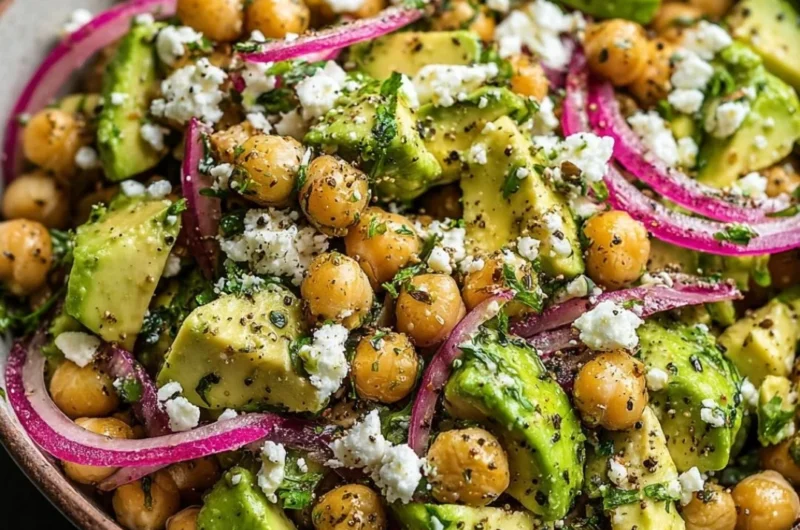 Healthy Chickpea Feta Avocado Salad with fresh vegetables and herbs