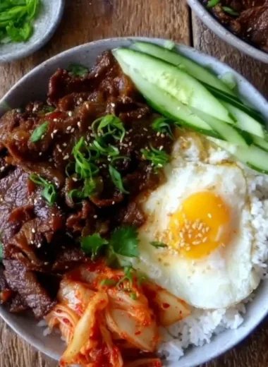 Delicious easy beef bulgogi bowl garnished with vegetables and sesame seeds