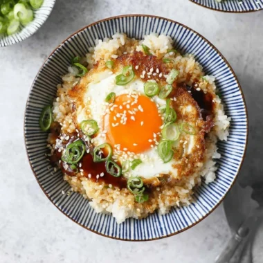 Delicious Korean Egg Rice served in a bowl with vegetables