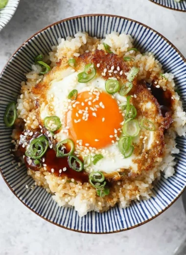 Delicious Korean Egg Rice served in a bowl with vegetables
