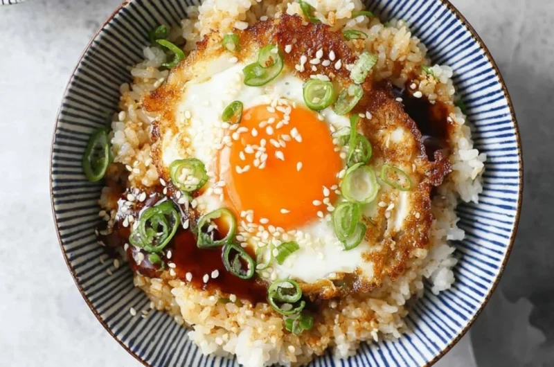 Delicious Korean Egg Rice served in a bowl with vegetables