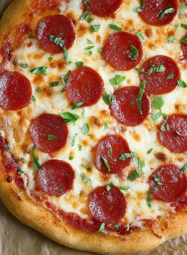 Delicious pepperoni pizza with melted cheese and fresh toppings