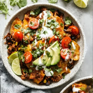 Delicious quick one-pan enchilada topped with cheese and fresh ingredients