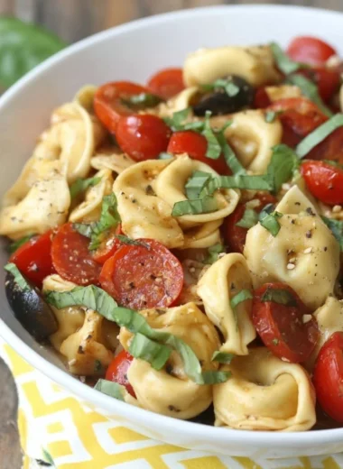 Roasted red pepper and Parmesan tortellini salad in a bowl