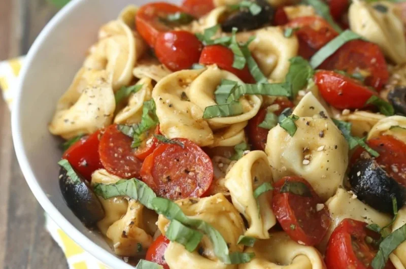 Roasted red pepper and Parmesan tortellini salad in a bowl