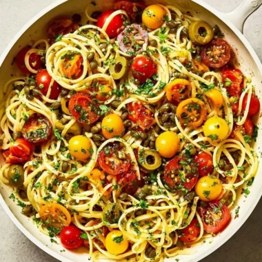 Delicious one-pot pasta dish ready to serve filled with fresh ingredients.