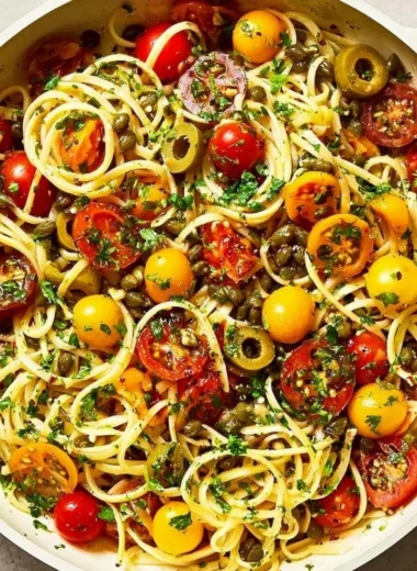 Delicious one-pot pasta dish ready to serve filled with fresh ingredients.