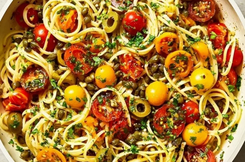 Delicious one-pot pasta dish ready to serve filled with fresh ingredients.
