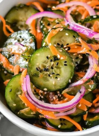 Colorful Asian cucumber salad in a bowl, ideal for Paleo, Whole30, and Keto diets