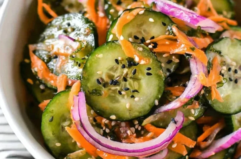 Colorful Asian cucumber salad in a bowl, ideal for Paleo, Whole30, and Keto diets