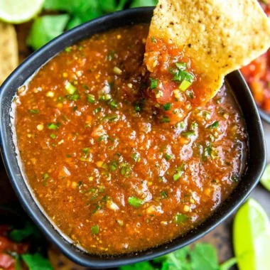 Freshly made Blender Salsa in a bowl with vibrant vegetables and spices.