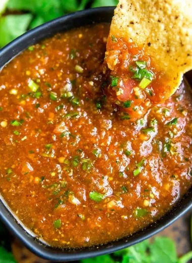 Freshly made Blender Salsa in a bowl with vibrant vegetables and spices.