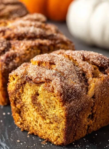 Cinnamon Swirl Pumpkin Bread Minis fresh out of the oven, perfect for fall snacking.