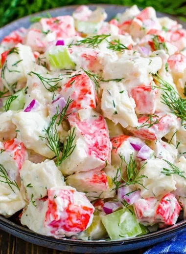 Delicious crab salad with fresh ingredients and vibrant colors served in a bowl