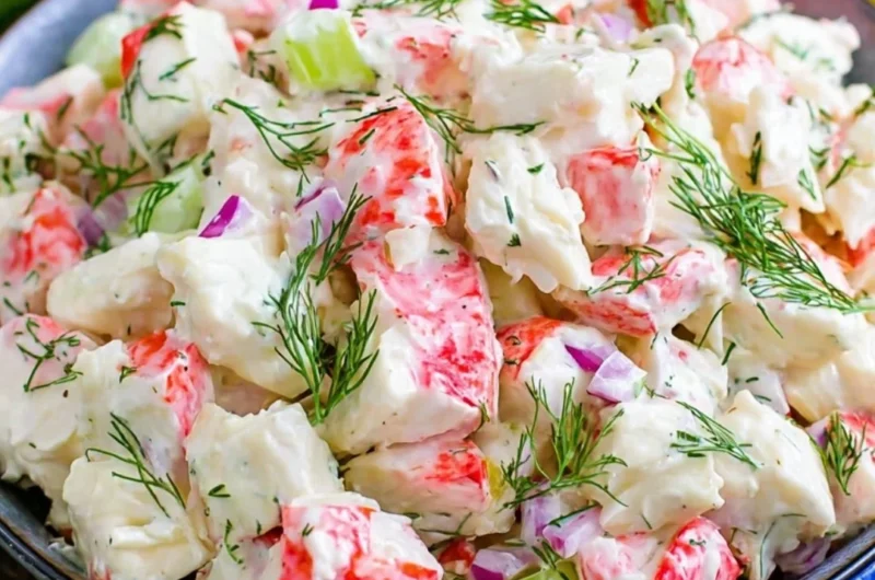 Delicious crab salad with fresh ingredients and vibrant colors served in a bowl