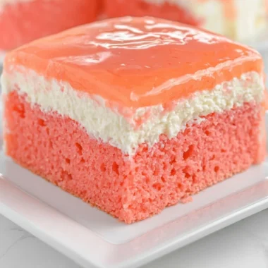 Delicious slice of Hawaiian Guava Cake topped with fresh guava slices