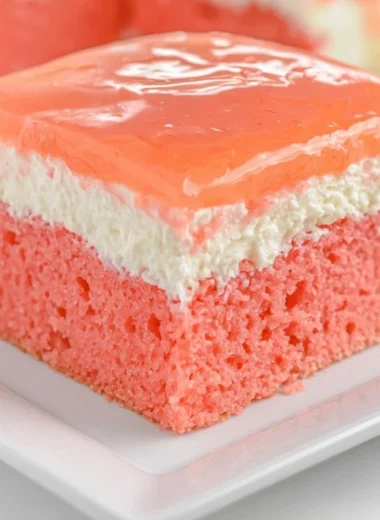 Delicious slice of Hawaiian Guava Cake topped with fresh guava slices