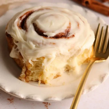 Freshly baked homemade cinnamon rolls with icing
