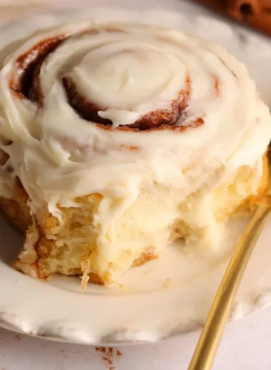 Freshly baked homemade cinnamon rolls with icing