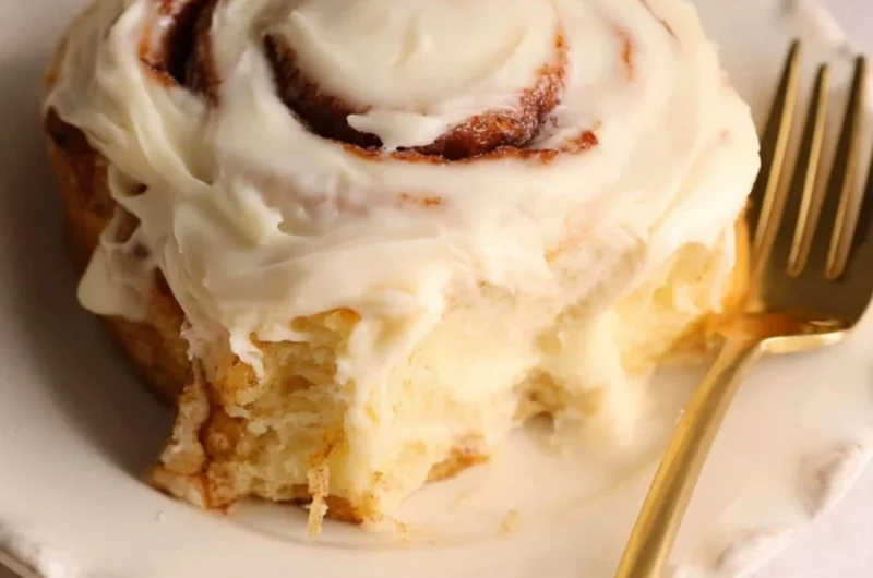 Freshly baked homemade cinnamon rolls with icing