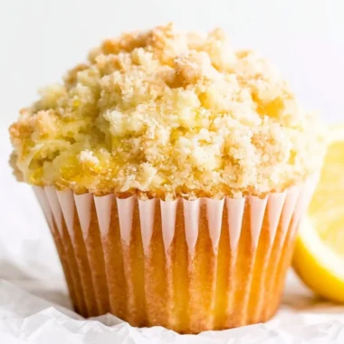 Freshly baked lemon muffins with a crunchy streusel topping