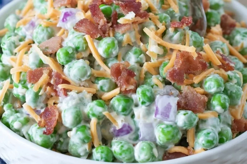 Old Fashioned Pea Salad served in a bowl with colorful ingredients