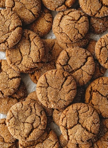 Baked old fashioned soft molasses sugar cookies on a cooling rack
