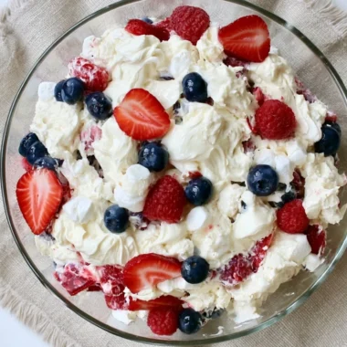 Delicious Red White and Blue Cheesecake Salad with berries and cream cheese