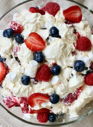 Delicious Red White and Blue Cheesecake Salad with berries and cream cheese