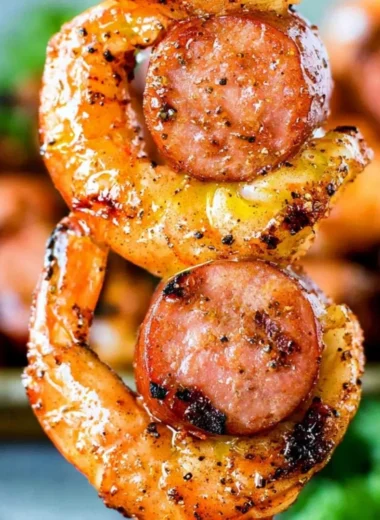 Delicious Sausage & Shrimp Kabobs on skewers, perfect for grilling.