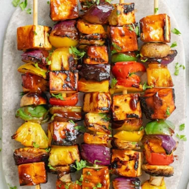 Colorful vegetarian kebabs grilled with vegetables and spices