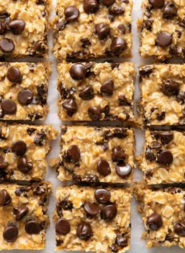 4 Ingredient No Bake Peanut Butter Oatmeal Bars on a plate with a bite taken out