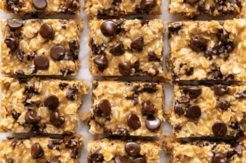 4 Ingredient No Bake Peanut Butter Oatmeal Bars on a plate with a bite taken out