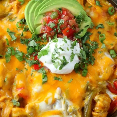 Cheesy Chicken Fajitas Casserole with colorful peppers and melted cheese