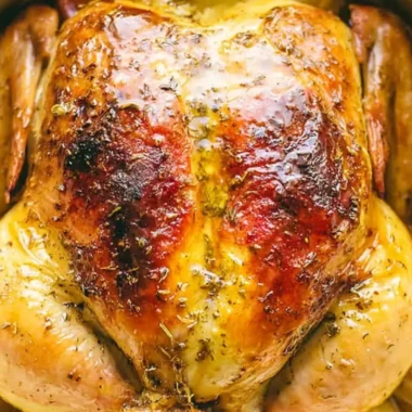 Mouthwatering Dutch oven whole chicken with herbs and vegetables