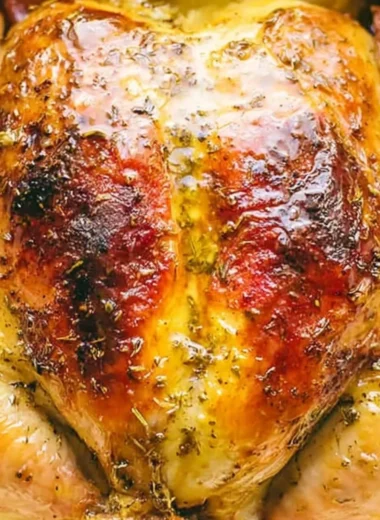 Mouthwatering Dutch oven whole chicken with herbs and vegetables