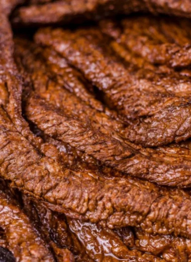 Juicy grilled beef steak served on a plate with herbs and spices