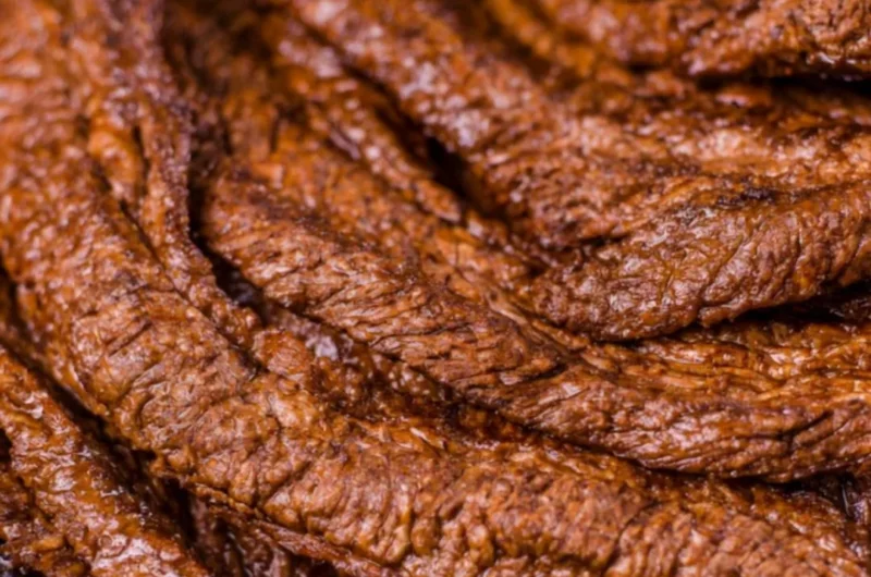 Juicy grilled beef steak served on a plate with herbs and spices