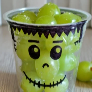 Healthy Halloween snacks including fruits and nut mixes for a festive treat.