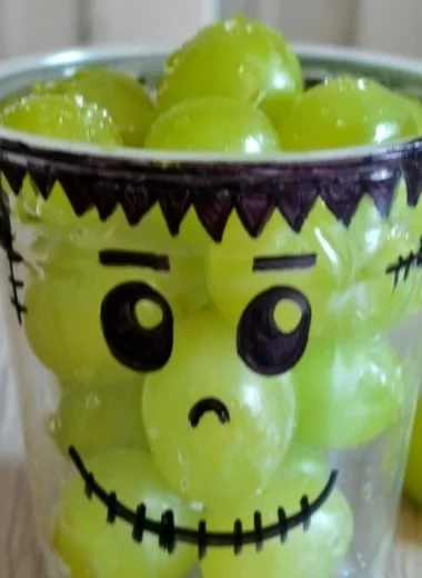 Healthy Halloween snacks including fruits and nut mixes for a festive treat.