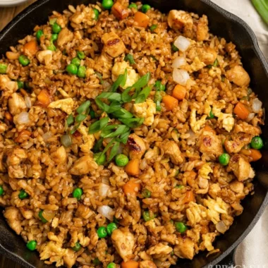 Delicious Hibachi Chicken Fried Rice served in a bowl with vegetables.