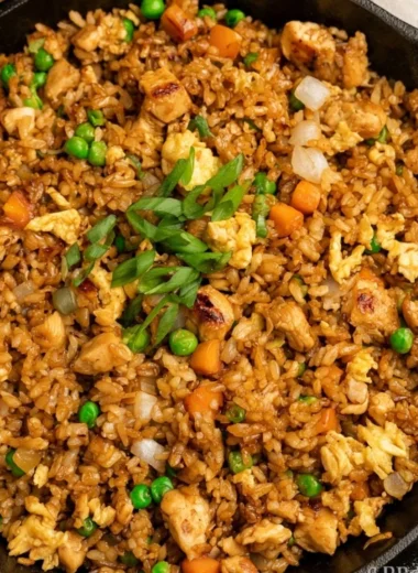 Delicious Hibachi Chicken Fried Rice served in a bowl with vegetables.