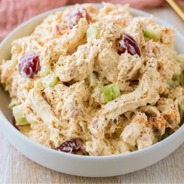 High protein cottage cheese chicken salad served in a bowl with fresh vegetables