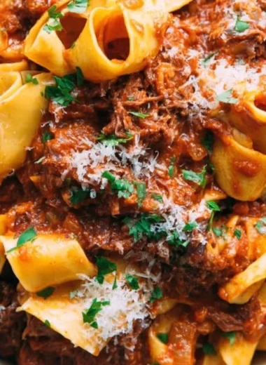 Delicious homemade short rib ragu served on pasta