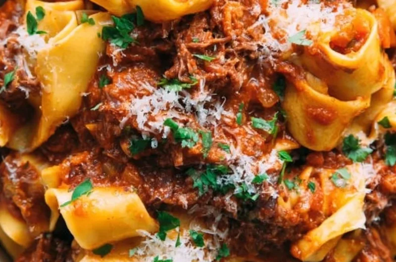 Delicious homemade short rib ragu served on pasta