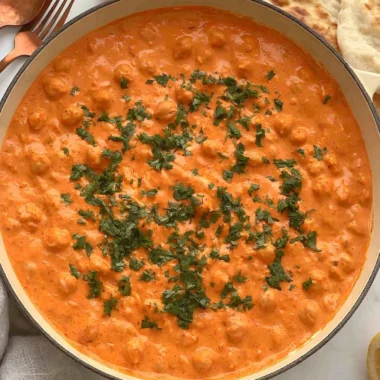 A delicious bowl of Indian Butter Chickpeas garnished with fresh cilantro