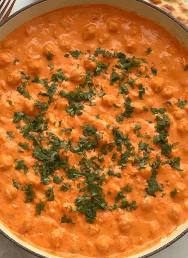 A delicious bowl of Indian Butter Chickpeas garnished with fresh cilantro
