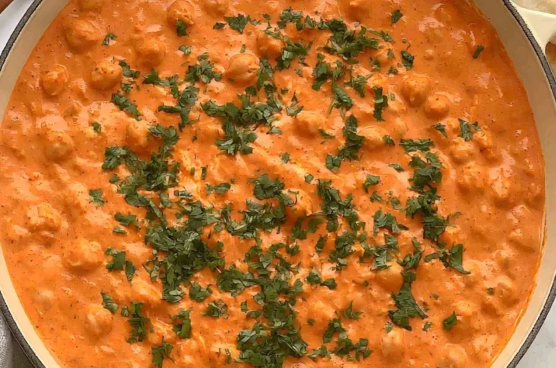 A delicious bowl of Indian Butter Chickpeas garnished with fresh cilantro