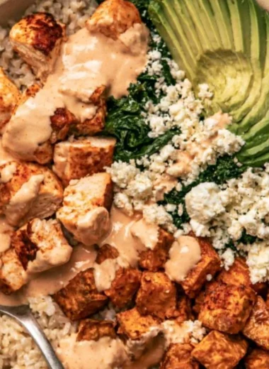 Roasted Chicken and Sweet Potato Rice Bowl with fresh vegetables.