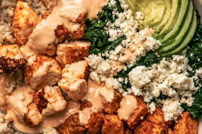 Roasted Chicken and Sweet Potato Rice Bowl with fresh vegetables.